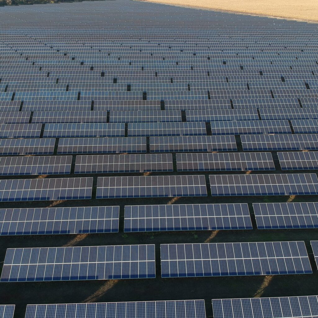 aerial-photo-of-solar-power-plant-many-solar-ener-2022-12-16-14-55-01-utc-min
